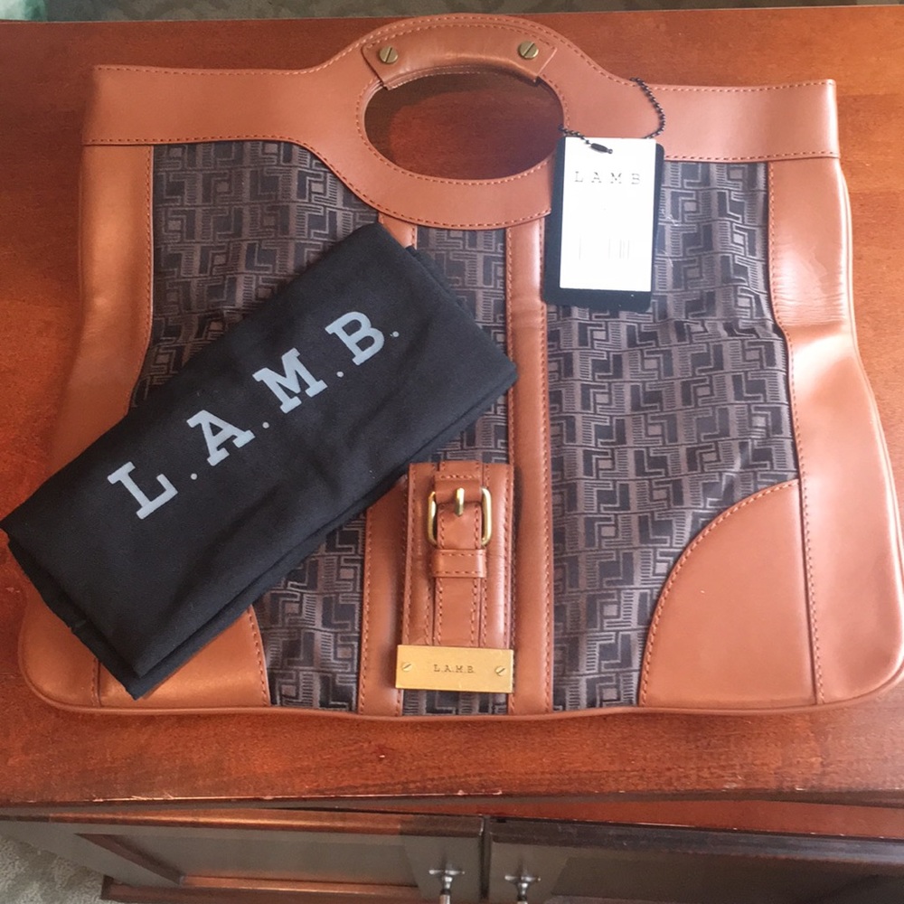 L.A.M.B clutch to tote convertible.